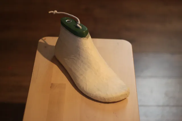 shoe last covered in marking tape